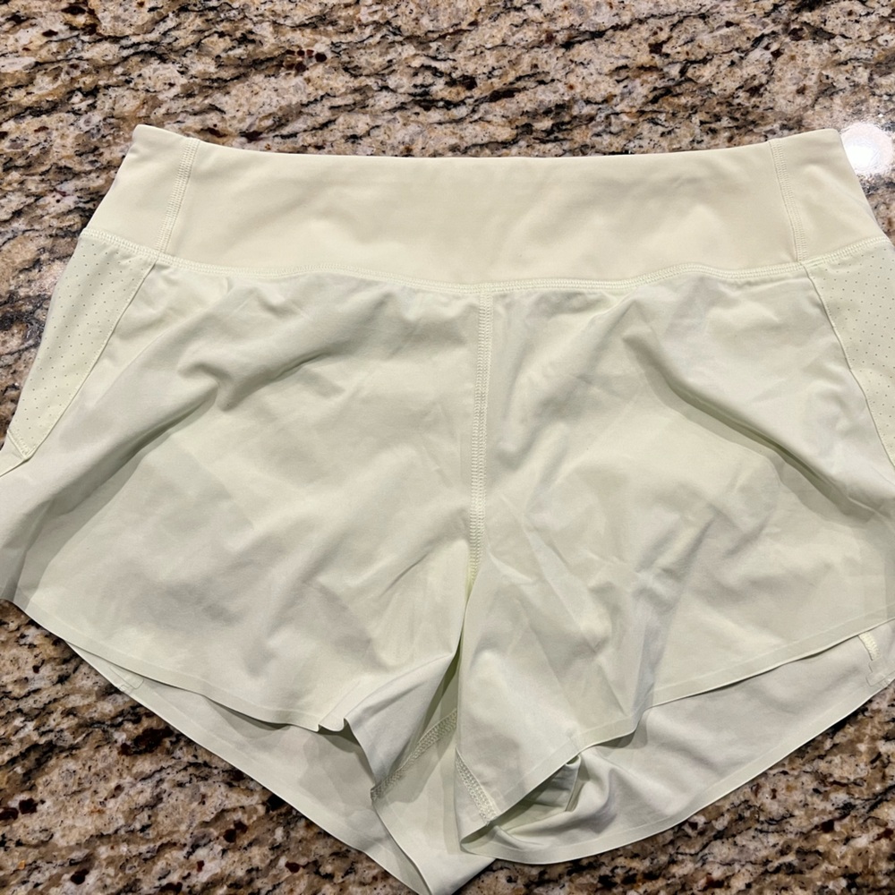 Athleta Run With it - 3.5
Size - Medium 
ONLY light green/ Lime green available